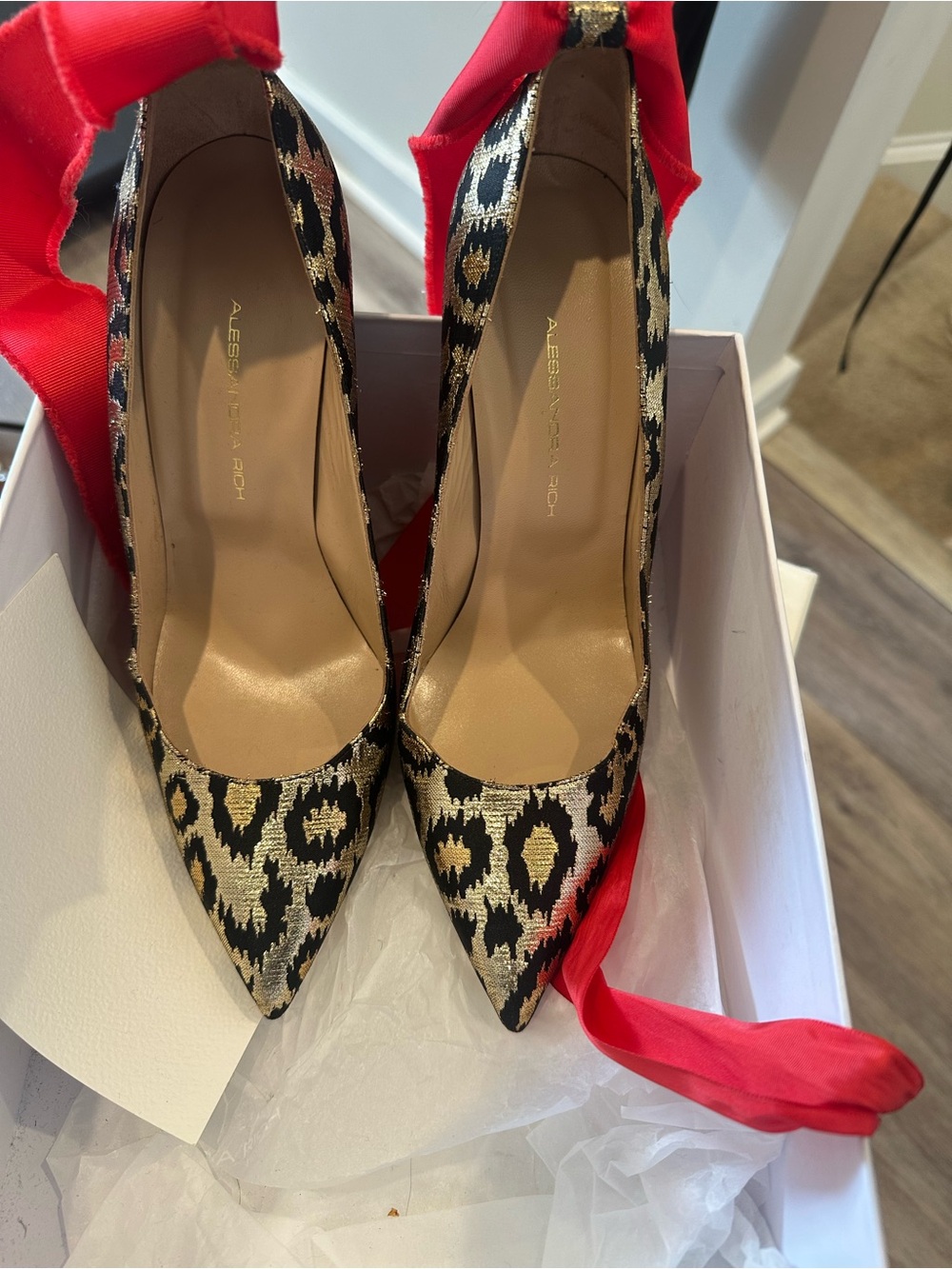 Alessandra Rich Black and Gold Leopard-Print Pointed Pumps with Red Ribbon Tie
